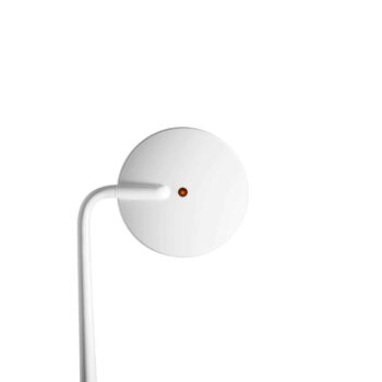 The Pixo Plus Table lamp, featuring a round white wall light and a slender curved arm, is elegantly presented in a side view against a plain white background.