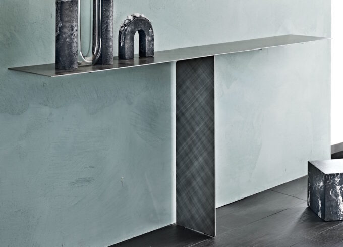 tee console table with minimal lines and industrial design in a modern open-plan living space