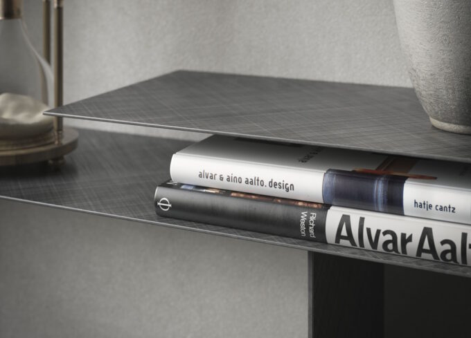 tee console table with minimal lines and industrial design in a modern open-plan living space