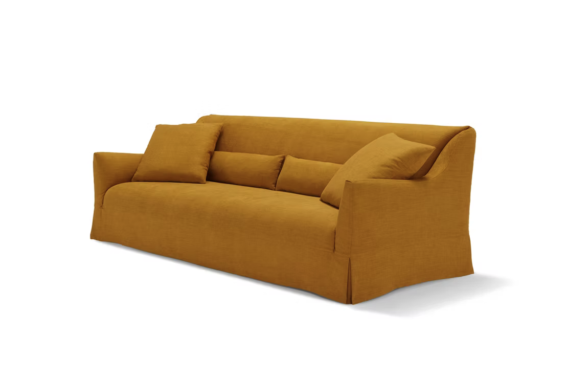 The Ralph Sofa is a mustard yellow upholstered piece with a skirted base, two large seat cushions, and two matching throw pillows.