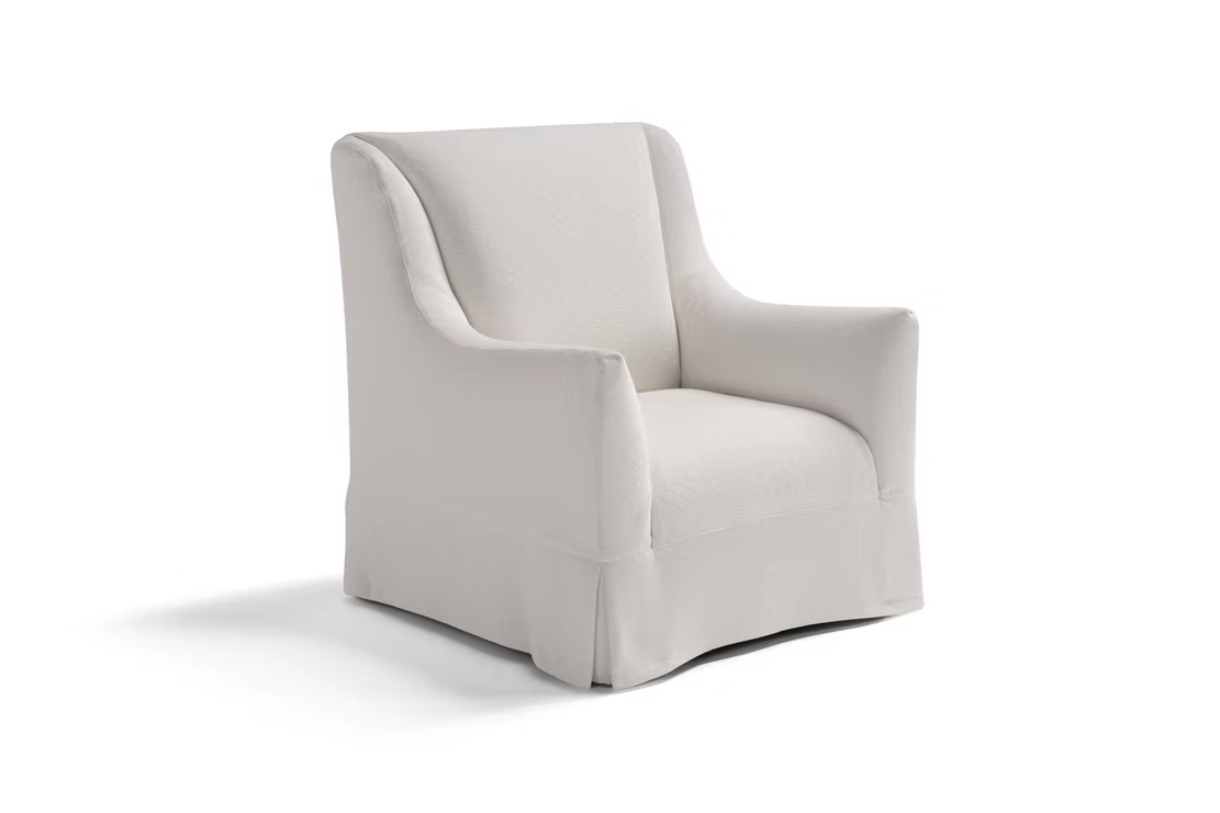 The Ralph Sofa features white upholstery, a skirted bottom, and gently curved arms, shown against a plain white background.